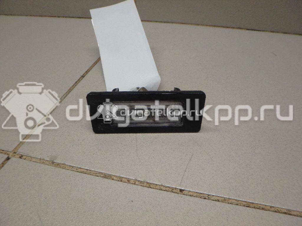 Фото Фонарь подсветки номера  8T0943021 для Skoda Fabia / Superb / Yeti 5L {forloop.counter}}