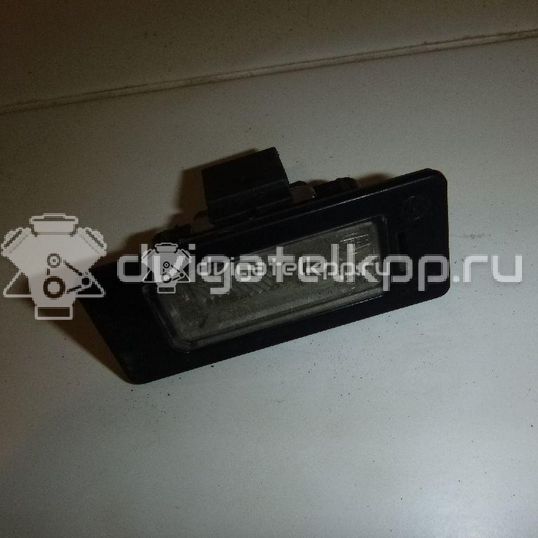 Фото Фонарь подсветки номера  8T0943021 для Skoda Fabia / Superb / Yeti 5L