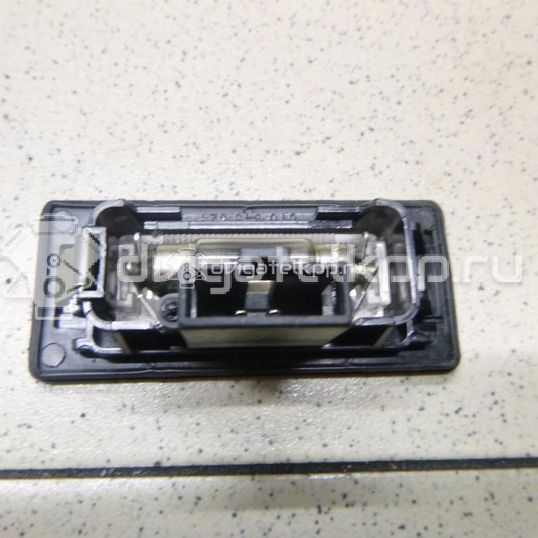 Фото Фонарь подсветки номера  8T0943021 для Skoda Fabia / Superb / Yeti 5L