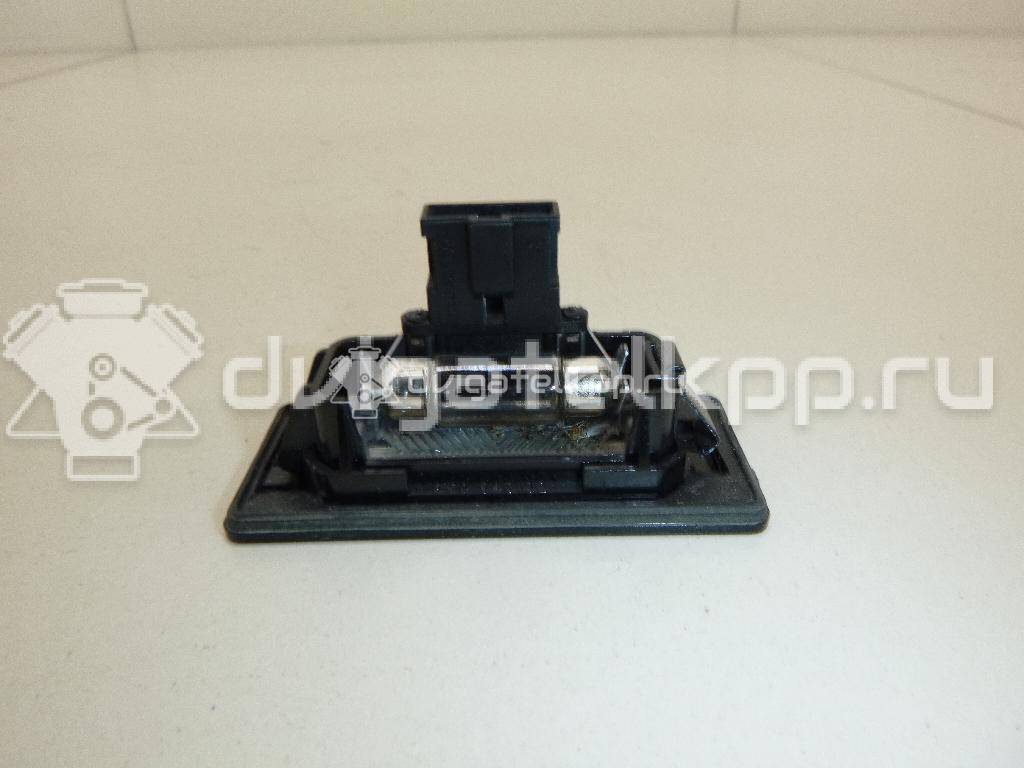 Фото Фонарь подсветки номера  8T0943021 для Skoda Fabia / Superb / Yeti 5L {forloop.counter}}