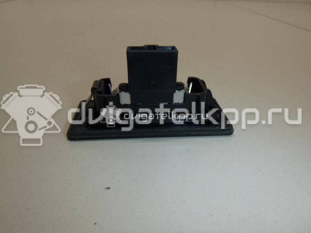 Фото Фонарь подсветки номера  8T0943021 для Skoda Fabia / Superb / Yeti 5L {forloop.counter}}