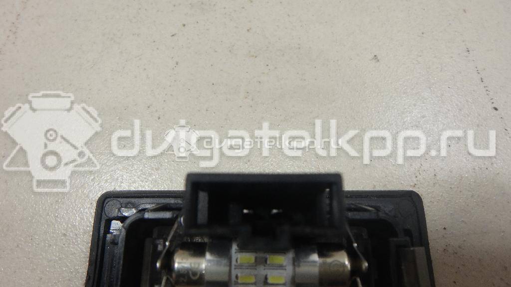 Фото Фонарь подсветки номера  8T0943021 для Skoda Fabia / Superb / Yeti 5L {forloop.counter}}