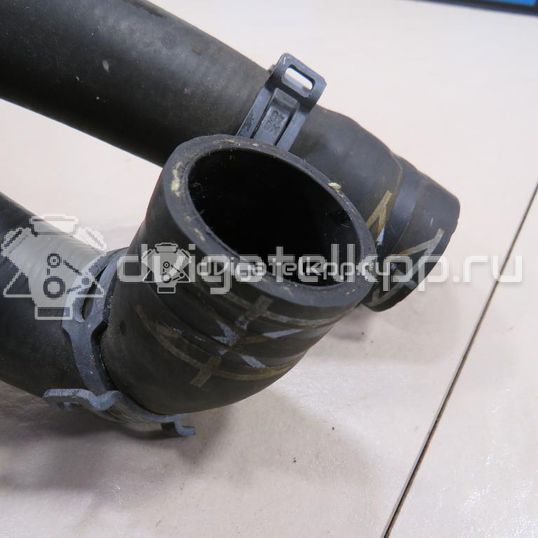 Фото Патрубок радиатора  6R0122101AB для skoda Fabia