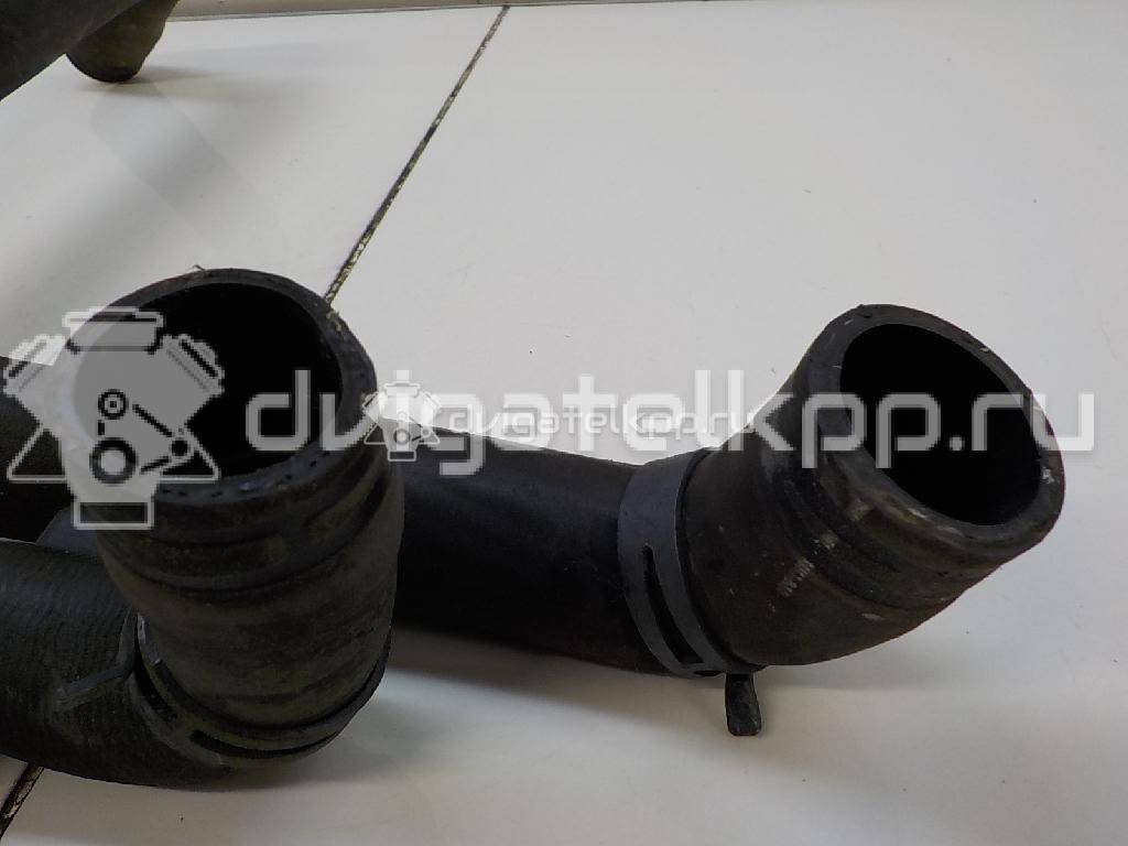 Фото Патрубок радиатора  1J0121049E для Skoda Octavia {forloop.counter}}