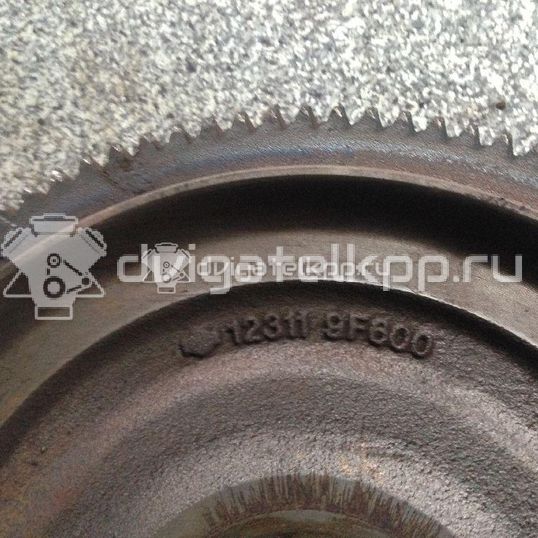 Фото Маховик для двигателя QG18DE для Nissan Primera / Almera 106-128 л.с 16V 1.8 л бензин 123119F600