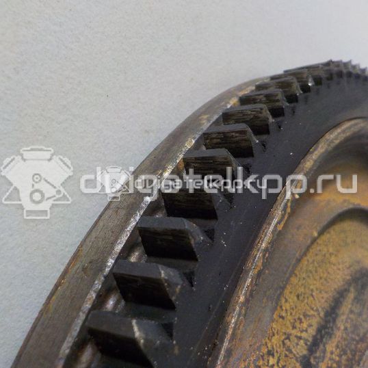 Фото Маховик для двигателя QG18DE для Nissan Primera / Almera 106-128 л.с 16V 1.8 л бензин 123119F600